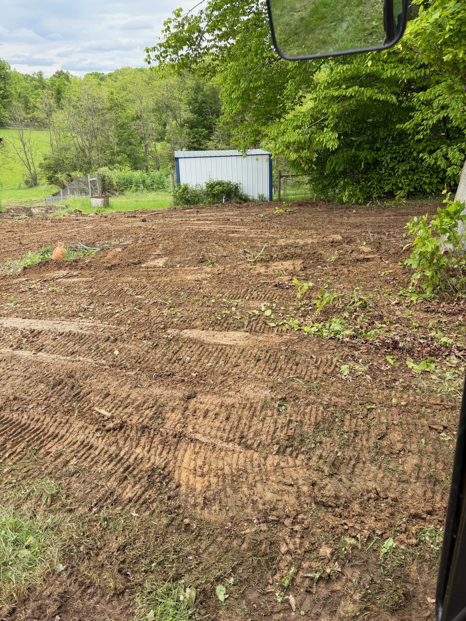 Field cleared of overgrowth and brush