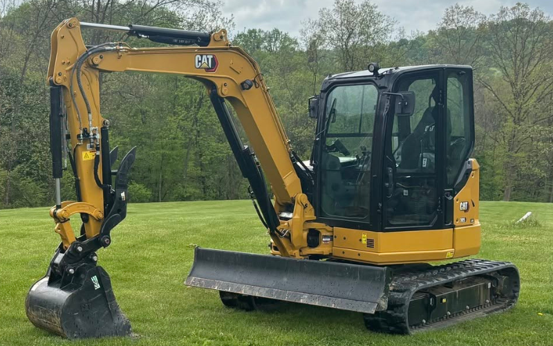 Mini excavator digging