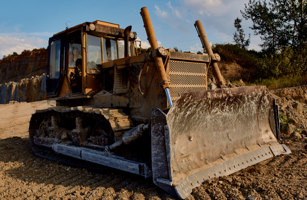 Grading and leveling earthwork on job site