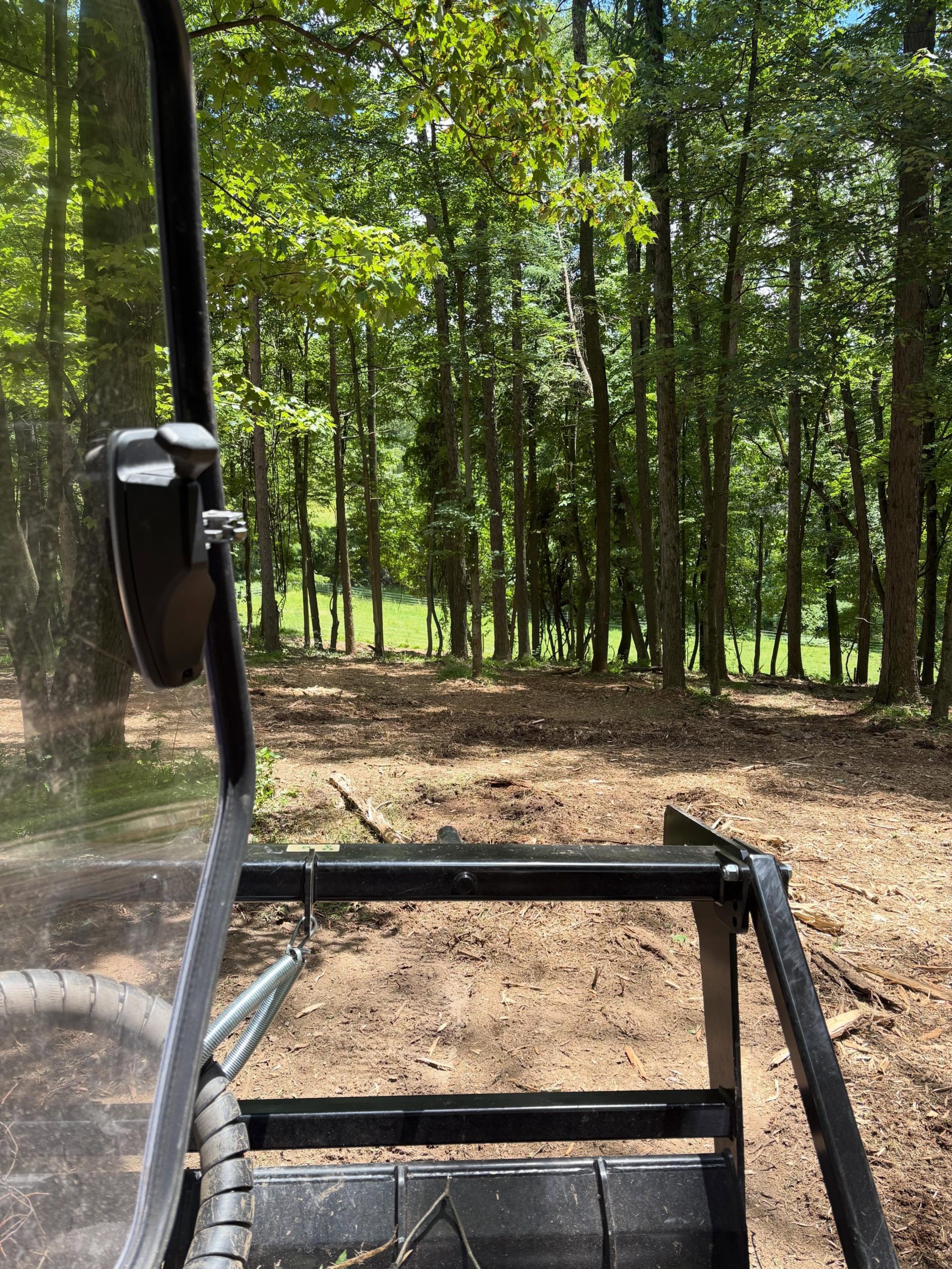 CAT track loader with forestry mulcher attachment